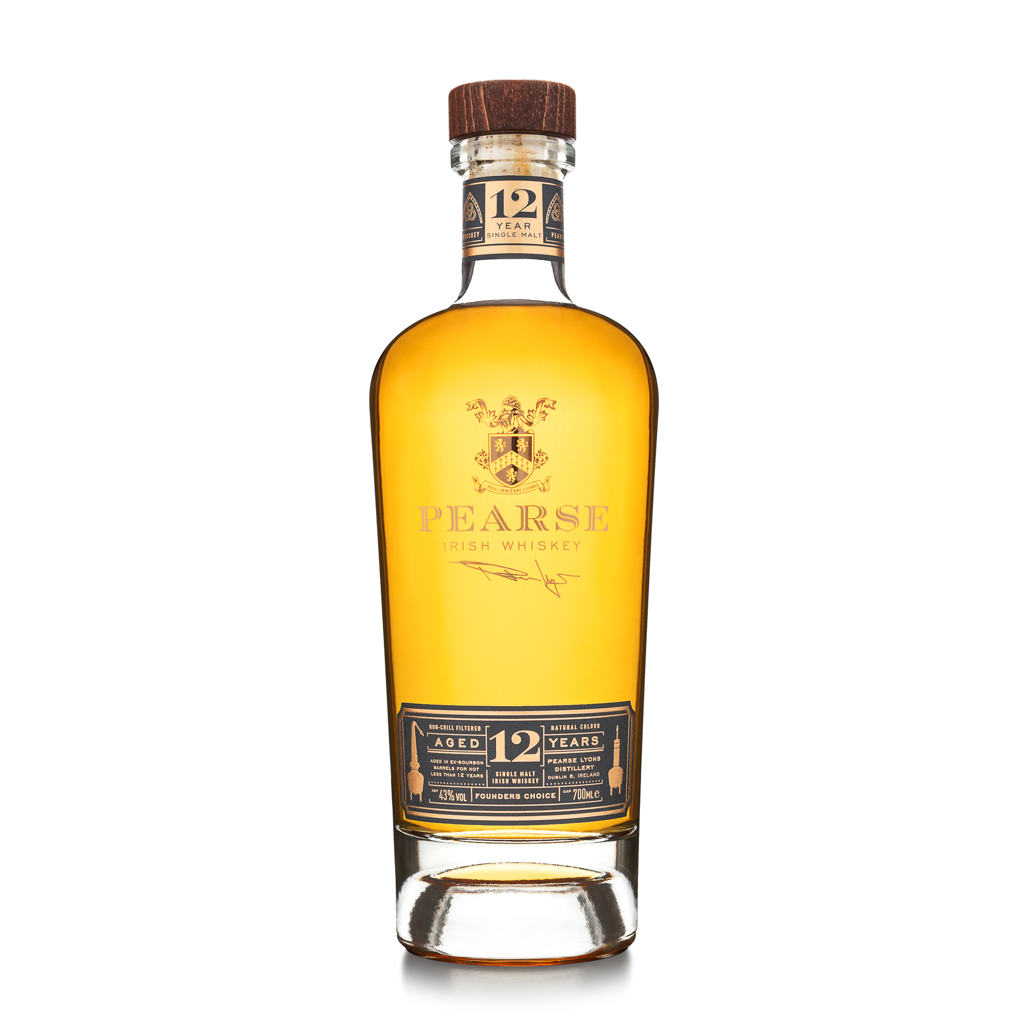 An unforgettable Pearse 12 Year Old from Pearse Lyons Distillery with a wooden cap and gold label.
